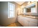 Bathroom featuring a double vanity with stone countertops at 10120 Fox Trce, Zionsville, IN 46077