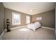 Well lit bedroom featuring two windows at 10120 Fox Trce, Zionsville, IN 46077