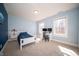 Bright bedroom with plenty of natural light, carpet, and blue paint at 10120 Fox Trce, Zionsville, IN 46077
