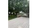 Inviting wooden deck with built-in bench seating, perfect for enjoying the outdoors at 10419 Dark Star Dr, Indianapolis, IN 46234