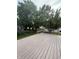Spacious deck offers a peaceful retreat with views of the lush, green backyard at 10419 Dark Star Dr, Indianapolis, IN 46234