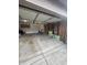 This garage is spacious with visible utilities along the wall at 10419 Dark Star Dr, Indianapolis, IN 46234