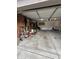 This garage is well lit with a high ceiling and open layout at 10419 Dark Star Dr, Indianapolis, IN 46234