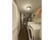 Laundry room with full-sized washer and dryer and utility sink at 10419 Dark Star Dr, Indianapolis, IN 46234