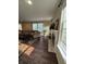 Bright living room with a fireplace, hardwood floors, and large windows, offering a cozy and inviting atmosphere at 10419 Dark Star Dr, Indianapolis, IN 46234