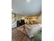 Comfortable living room with hardwood floors, an open layout, and easy access to the staircase and dining area at 10419 Dark Star Dr, Indianapolis, IN 46234