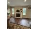 Bright living room showcasing a fireplace, hardwood floors, and neutral paint at 10419 Dark Star Dr, Indianapolis, IN 46234