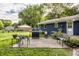 Spacious backyard with a patio, grill, seating, and lush green grass at 11710 Prairie Pl, Carmel, IN 46033