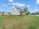 Spacious backyard with a lush green lawn and plenty of room for outdoor activities at 12650 Sunrise Dr, Noblesville, IN 46060