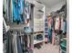 Walk-in closet featuring built-in shelving and ample space for organized storage and clothing at 12650 Sunrise Dr, Noblesville, IN 46060