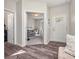 Warm entryway featuring stylish flooring and a view into the living area, creating a welcoming first impression at 12650 Sunrise Dr, Noblesville, IN 46060