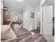 Bright entryway with wood-look flooring, a glimpse into the living area, and convenient access to upstairs at 12650 Sunrise Dr, Noblesville, IN 46060