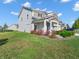 Beautiful home exterior featuring neutral siding, complementary trim, and a well-manicured lawn at 12650 Sunrise Dr, Noblesville, IN 46060