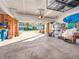 Spacious garage with an open door, revealing ample parking and storage space for vehicles and equipment at 12650 Sunrise Dr, Noblesville, IN 46060