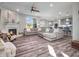 Bright and airy living room with a fireplace, open layout, and a seamless transition to the kitchen at 12650 Sunrise Dr, Noblesville, IN 46060