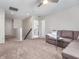 Inviting loft area with a comfortable couch and neutral color scheme, ideal for relaxation and casual gatherings at 12650 Sunrise Dr, Noblesville, IN 46060