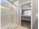 Shower and bedroom view in the bathroom featuring a glass shower enclosure and an adjoining bedroom at 12819 Bardolino Dr, Fishers, IN 46037
