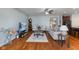Open living room with hardwood flooring and comfortable sofa seating at 12819 Bardolino Dr, Fishers, IN 46037