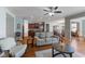 Spacious living room featuring hardwood floors and an open layout at 12819 Bardolino Dr, Fishers, IN 46037