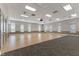 Large, neutral-toned meeting room with ample lighting, perfect for events and gatherings at 12819 Bardolino Dr, Fishers, IN 46037