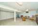 Finished basement featuring neutral carpet, storage, workout equipment and room for entertaining at 13060 Wembly Cir, Carmel, IN 46033