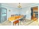 Charming dining room with a wooden table, stylish chairs, and a vintage display cabinet at 13060 Wembly Cir, Carmel, IN 46033