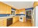 Functional kitchen with ample wood cabinetry, creating a warm and inviting culinary space at 13060 Wembly Cir, Carmel, IN 46033