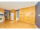 Bright kitchen featuring hardwood floors and generous storage, adjacent to additional living spaces at 13060 Wembly Cir, Carmel, IN 46033