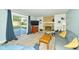 Spacious living room featuring a stone fireplace, built-in shelving, and a sliding glass door at 13060 Wembly Cir, Carmel, IN 46033
