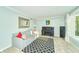 Cozy living room with a comfortable couch, piano, area rug and decorative mirror at 13060 Wembly Cir, Carmel, IN 46033