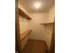 Walk-in closet featuring a wood floor, wooden shelves, and a built-in hanging rack at 145 Goodnight Rd, Martinsville, IN 46151