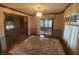 Bright dining room with rug and doorway to living room at 145 Goodnight Rd, Martinsville, IN 46151