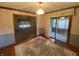 Formal dining room with a chandelier and doorway to sunroom at 145 Goodnight Rd, Martinsville, IN 46151
