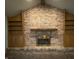 Living room with a brick fireplace and built-in bookcases at 145 Goodnight Rd, Martinsville, IN 46151