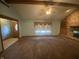 The living room features a brick fireplace and built-in shelves, offering a warm and inviting atmosphere at 145 Goodnight Rd, Martinsville, IN 46151