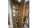 Spacious pantry with shelving for organized storage, located adjacent to the kitchen at 145 Goodnight Rd, Martinsville, IN 46151