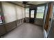 Relaxing screened porch with outdoor access and offering a seamless transition to the outdoors at 145 Goodnight Rd, Martinsville, IN 46151