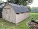 Outdoor storage shed with double doors and a neutral paint scheme at 145 Goodnight Rd, Martinsville, IN 46151
