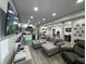 Spacious basement featuring bar, game, and entertainment areas is perfect for relaxing and entertaining at 1566 Dorset Dr, Avon, IN 46123