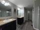 View of the bathroom featuring a dual sink vanity with a shower and neutral colored paint at 1566 Dorset Dr, Avon, IN 46123