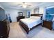Bedroom features a king bed, neutral color scheme and matching nightstands at 1566 Dorset Dr, Avon, IN 46123