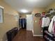 Walk-in closet featuring laminate floors, shelving, and a window that provides natural light at 1566 Dorset Dr, Avon, IN 46123
