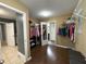 Walk-in closet featuring laminate floors, shelving, and a large space to organize clothing and accessories at 1566 Dorset Dr, Avon, IN 46123