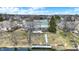 Spacious home features a sprawling backyard, mature trees, and convenient access to waterfront activities at 1852 Lakeside Ln, Indianapolis, IN 46229