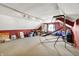 Bright bonus room with ample space for activities, featuring a basketball game and dormered ceilings at 1852 Lakeside Ln, Indianapolis, IN 46229
