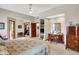 Bright main bedroom with plush carpet, closet and ensuite bath at 1852 Lakeside Ln, Indianapolis, IN 46229