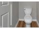 Bathroom with a toilet and new floors at 2014 Barth Ave, Indianapolis, IN 46203