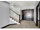 Finished basement with stairs and custom storage sliding doors that creates unique space at 20451 Chatham Hills Blvd, Westfield, IN 46074