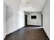 Unfinished basement featuring black trim against light grey walls and dark stained concrete flooring at 20451 Chatham Hills Blvd, Westfield, IN 46074