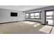 Spacious basement with large windows and a sliding glass door offers abundant natural light at 20451 Chatham Hills Blvd, Westfield, IN 46074